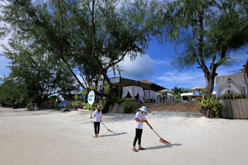 Cleaning the beach - Eden Beach Resort